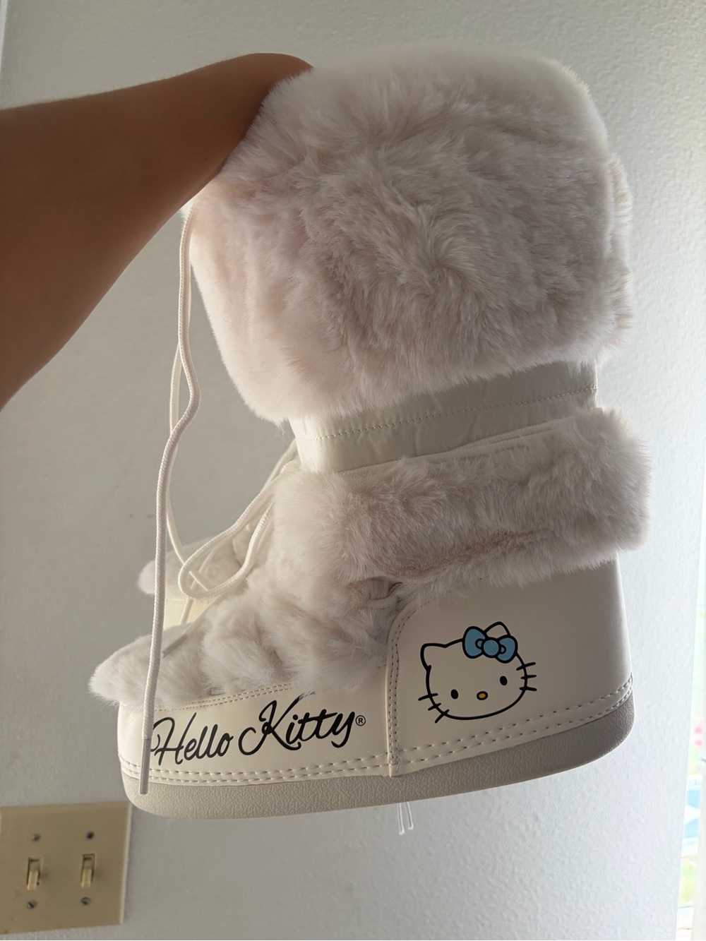 Hello Kitty Cream Faux-Fur Winter Boot with Blue Bow Accent - Picture 3 of 7